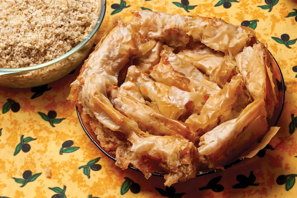 Freshly baked homemade banitsa on a patterned tablecloth