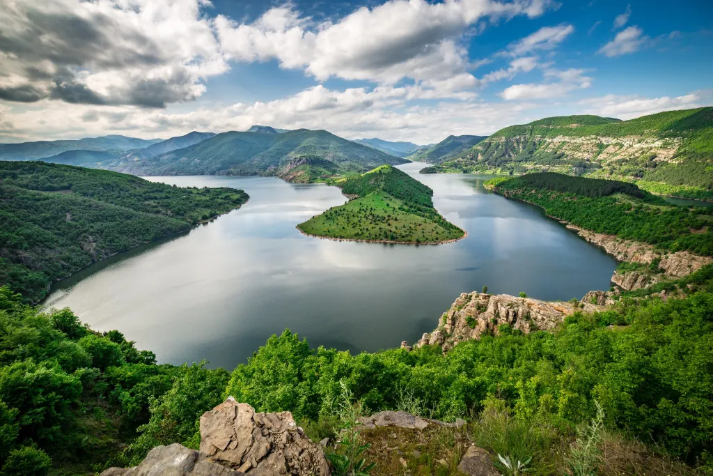 The Kardzhali reservoir winding between green hills in the Eastern Rhodopes
